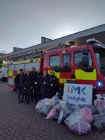 Wrap Up coat donation at Unity MK